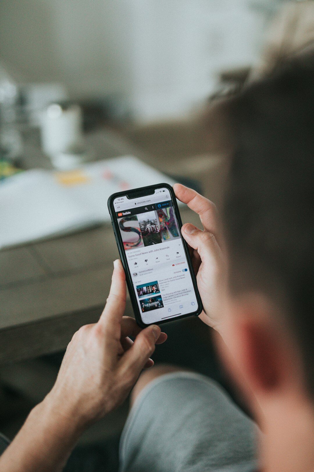 person scrolling social media on phone